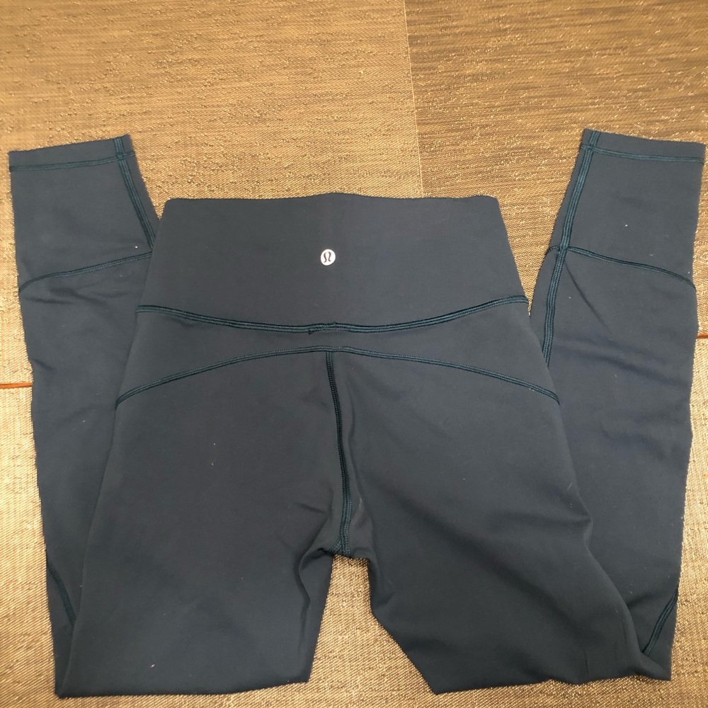Like New Lulu Lemon Size 6 teal In Movement Tight